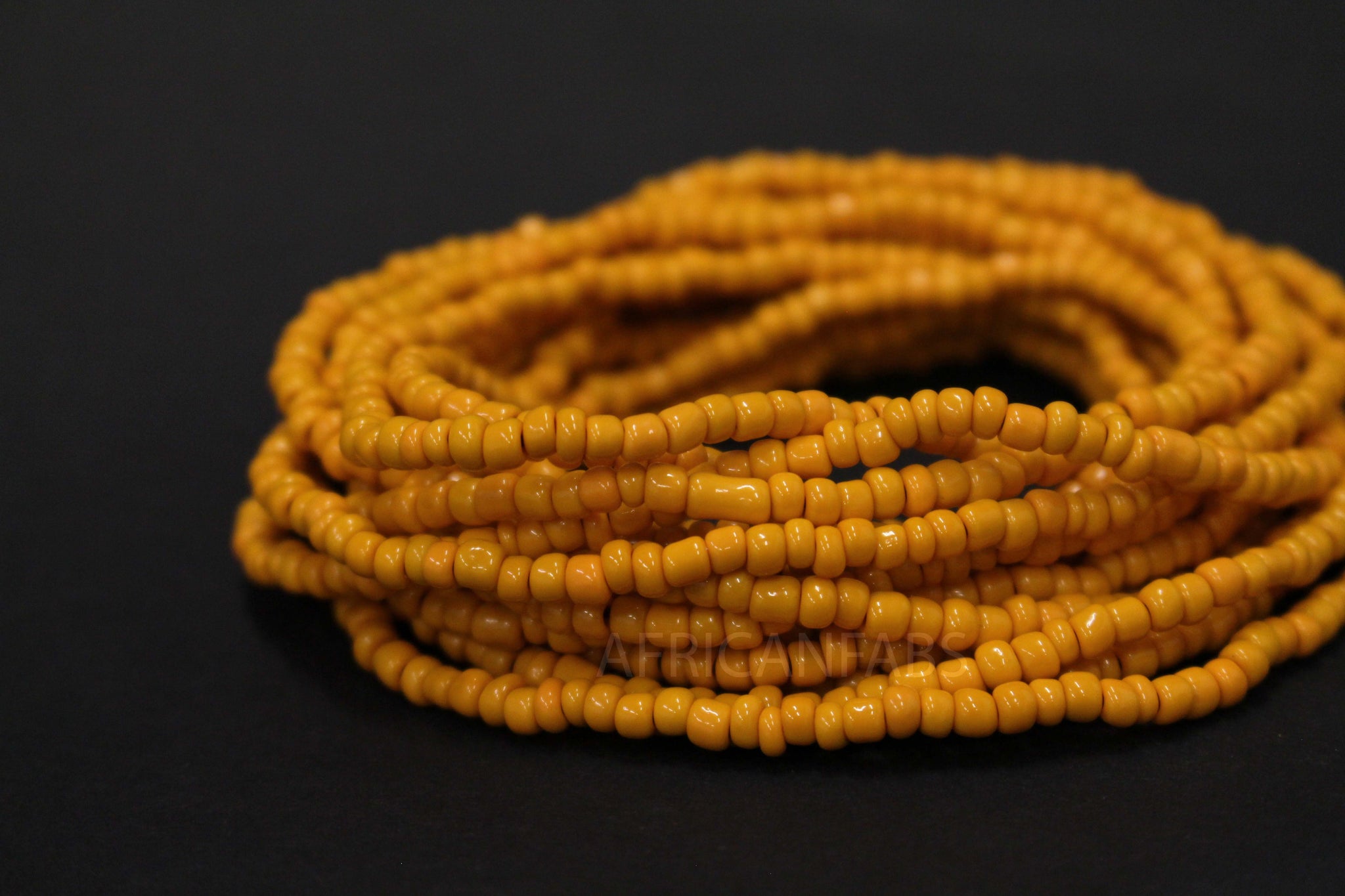 Waist Beads / Chaine de taille africaine - AIGBE - Jaune ocre (élastique)